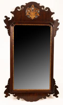 A George II parcel gilt mirror,