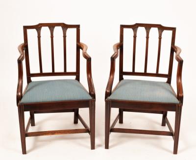 A pair of George III mahogany armchairs,