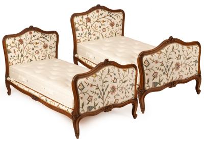 A pair of French single beds, the