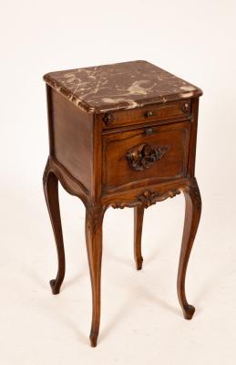 A French provincial bedside table with