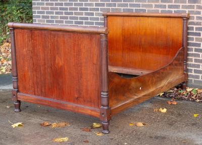 An Empire mahogany lit-en-bateau,