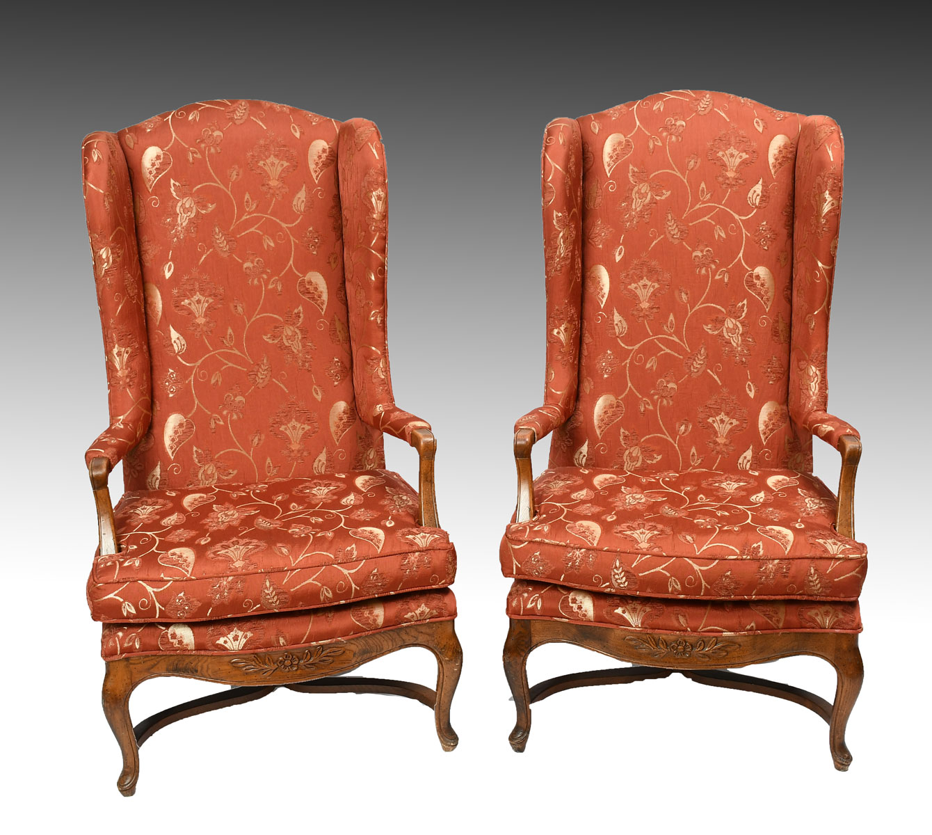 PAIR OF WING BACK CHAIRS: Upholstered