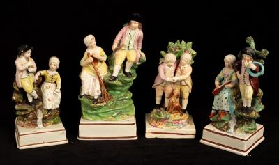 Four pearlware figure groups of