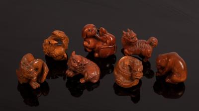 Seven Japanese carved boxwood netsuke,