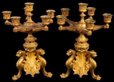 A pair of gilt metal table candelabra,