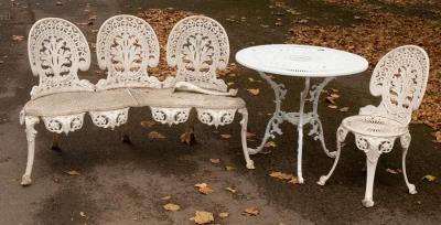 A painted metal three chair back bench,