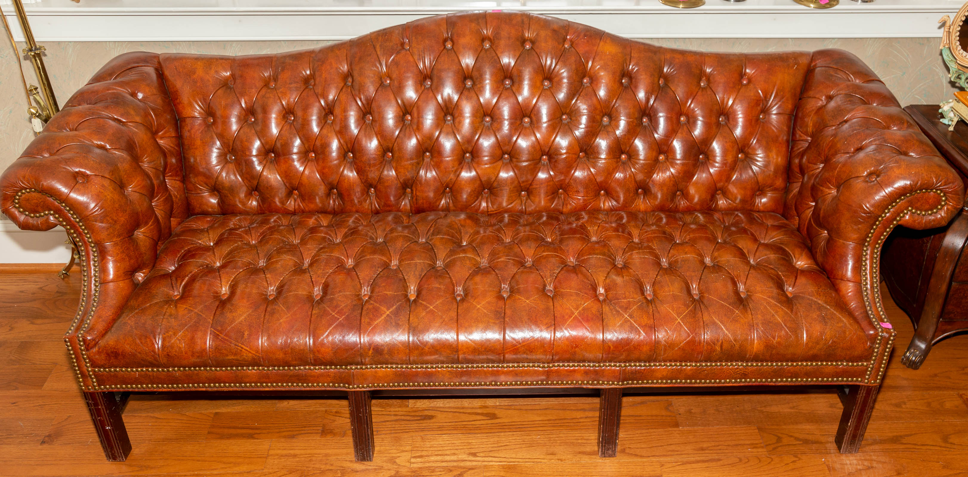A CHESTERFIELD FAUX LEATHER SOFA 36a200