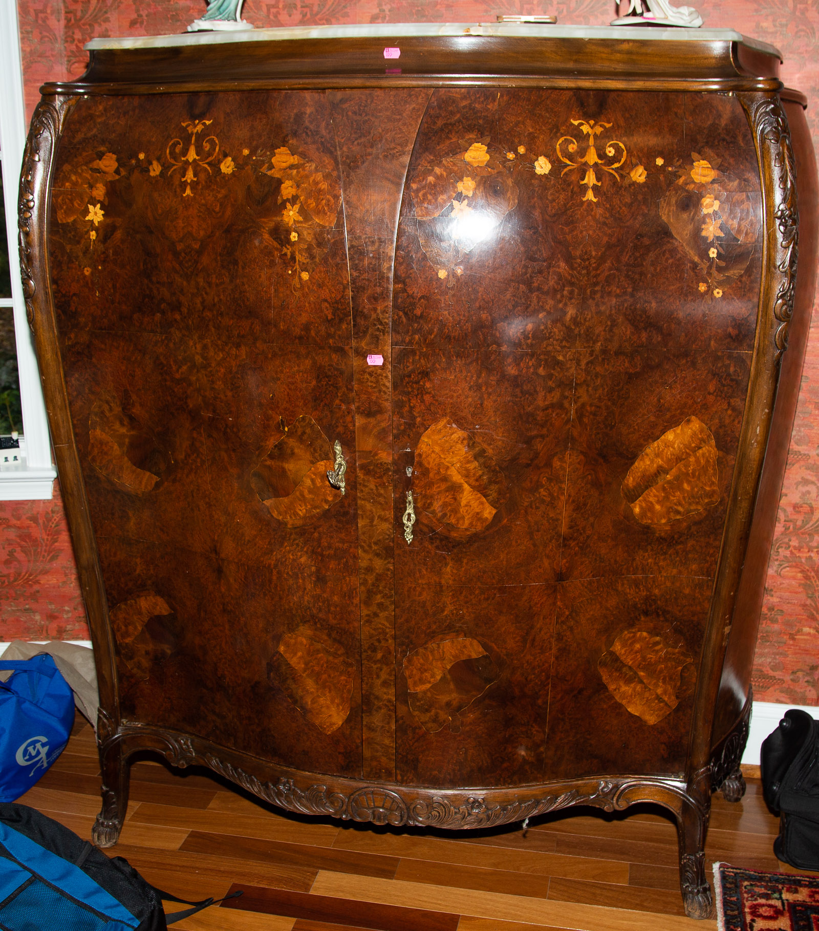 A BURLED WOOD MARBLE TOP ARMOIRE