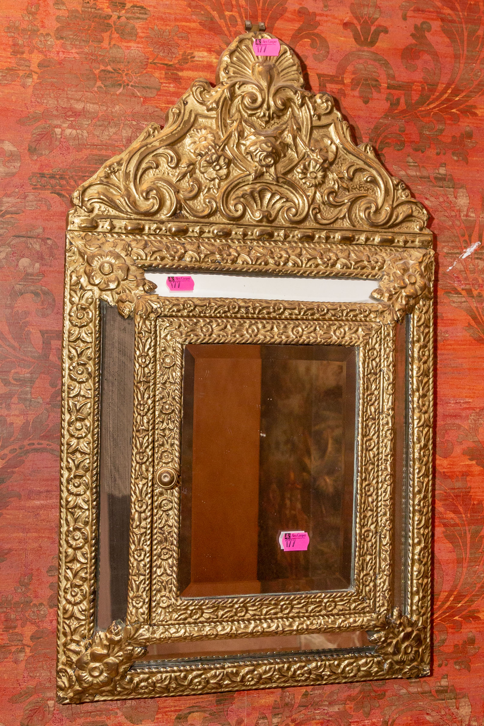 A HANGING WALL MOUNTED CABINET WITH
