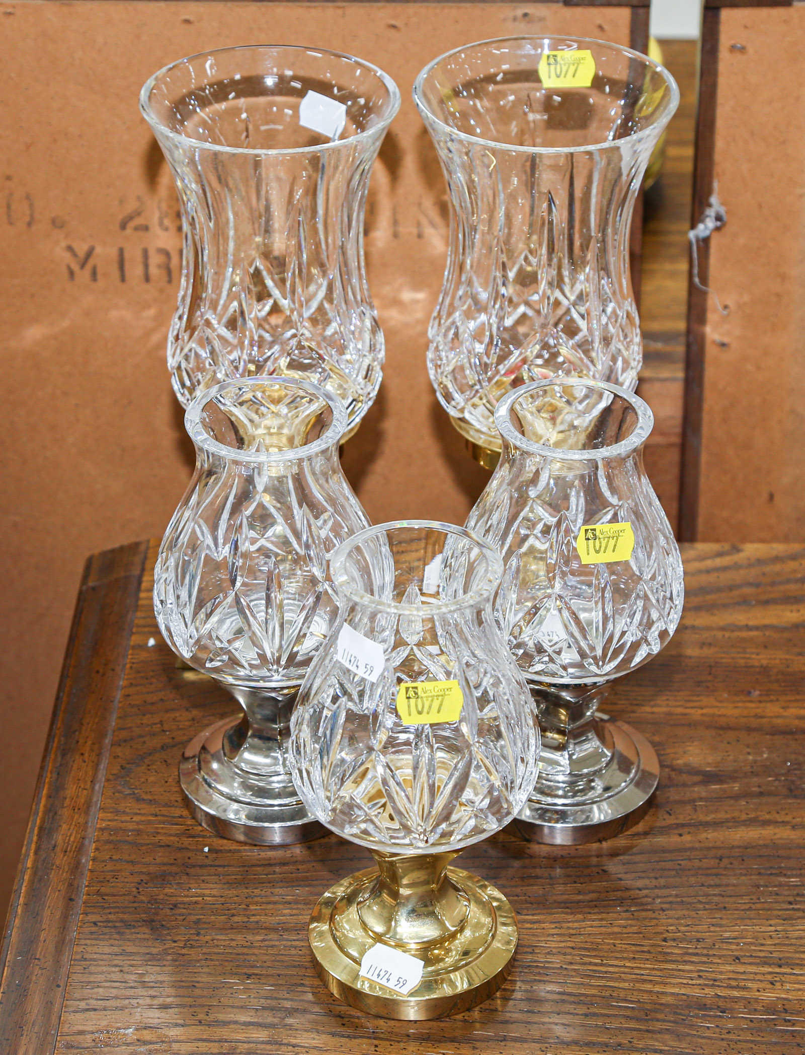 FIVE WATERFORD CANDLESTICKS With