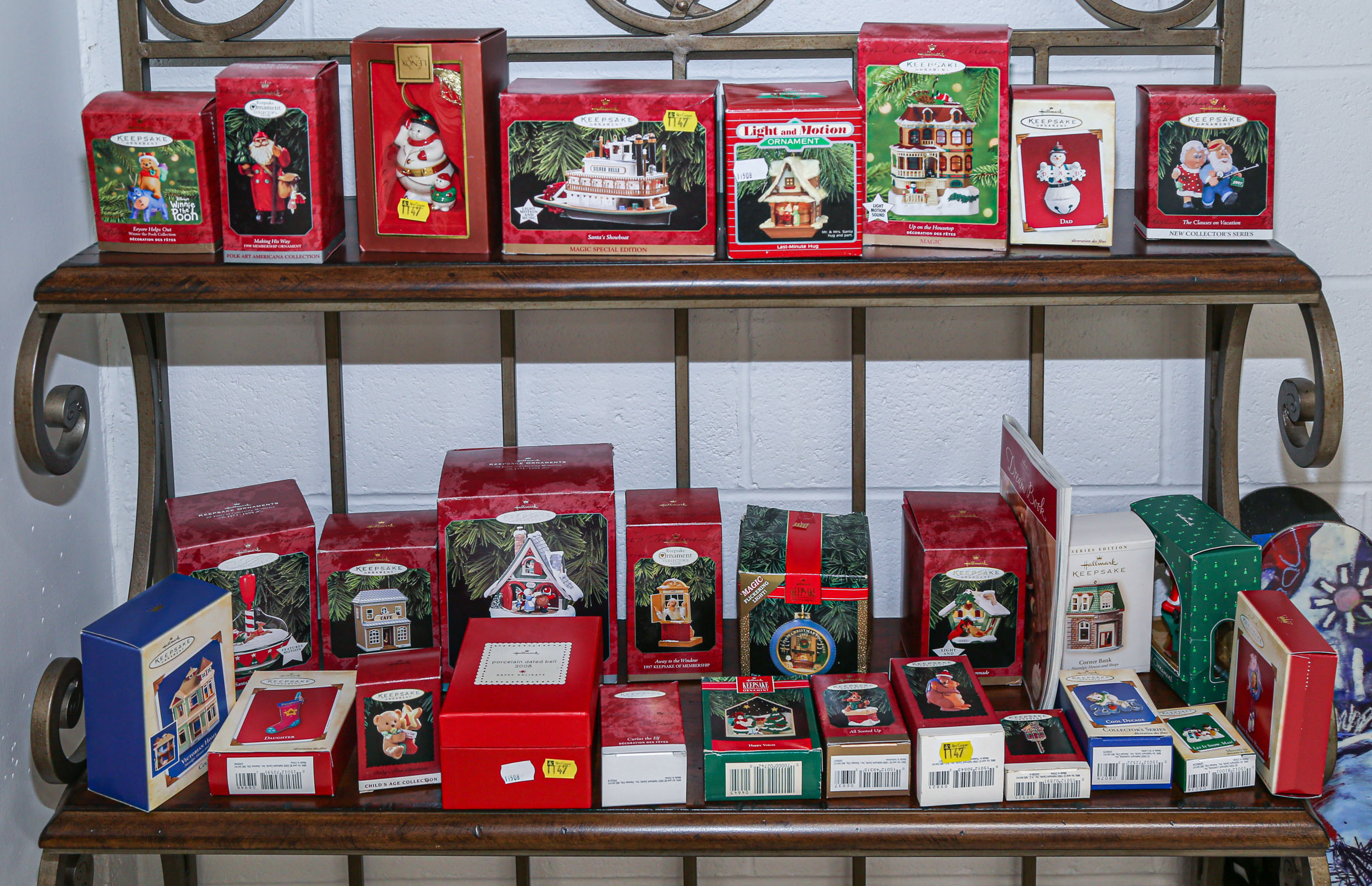 TWO SHELVES OF MOSTLY HALLMARK ORNAMENTS
