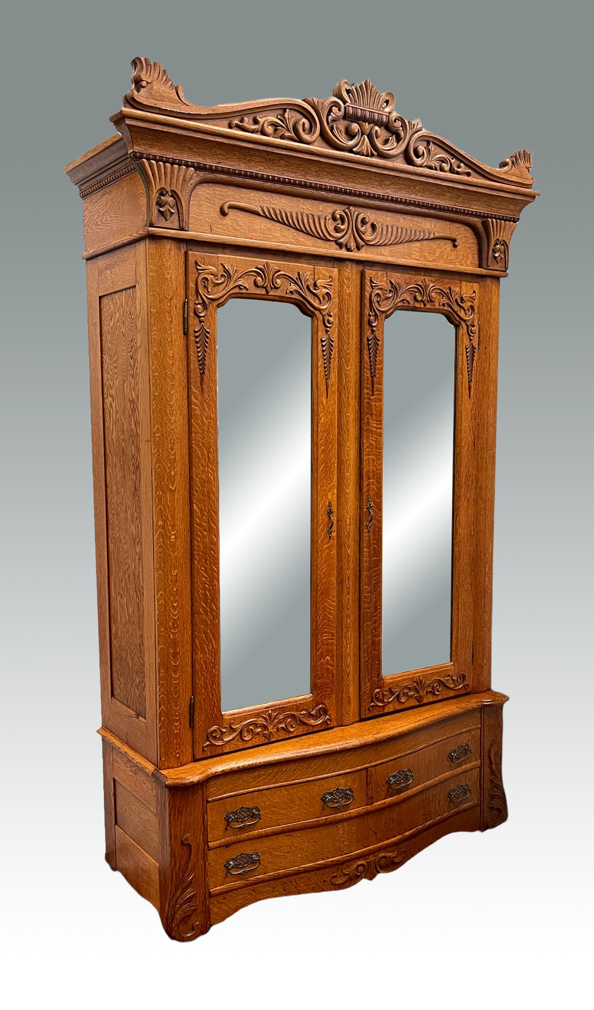 LARGE GOLDEN OAK ARMOIRE W CARVED 36a471