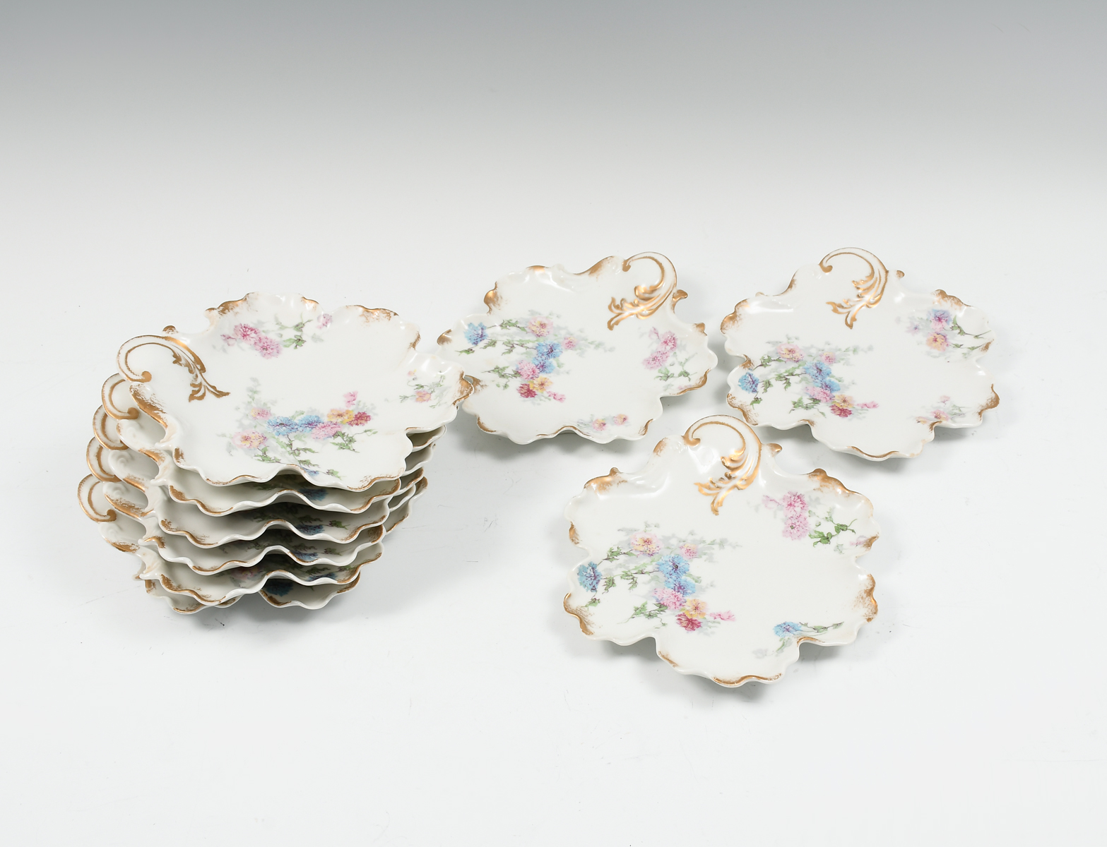 9 PC. FRENCH LIMOGES LEAF FORM PLATES: