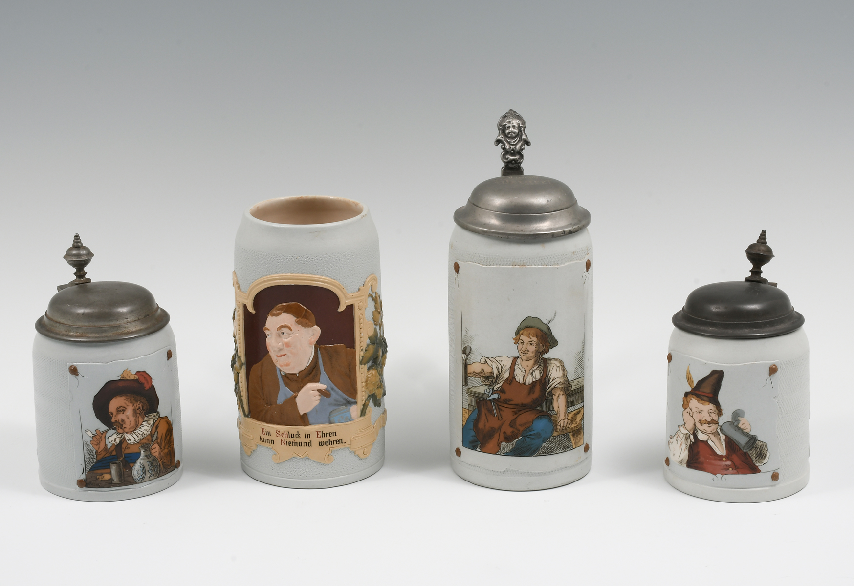 4 PC. VILLEROY & BOCH METTLACH STEINS: