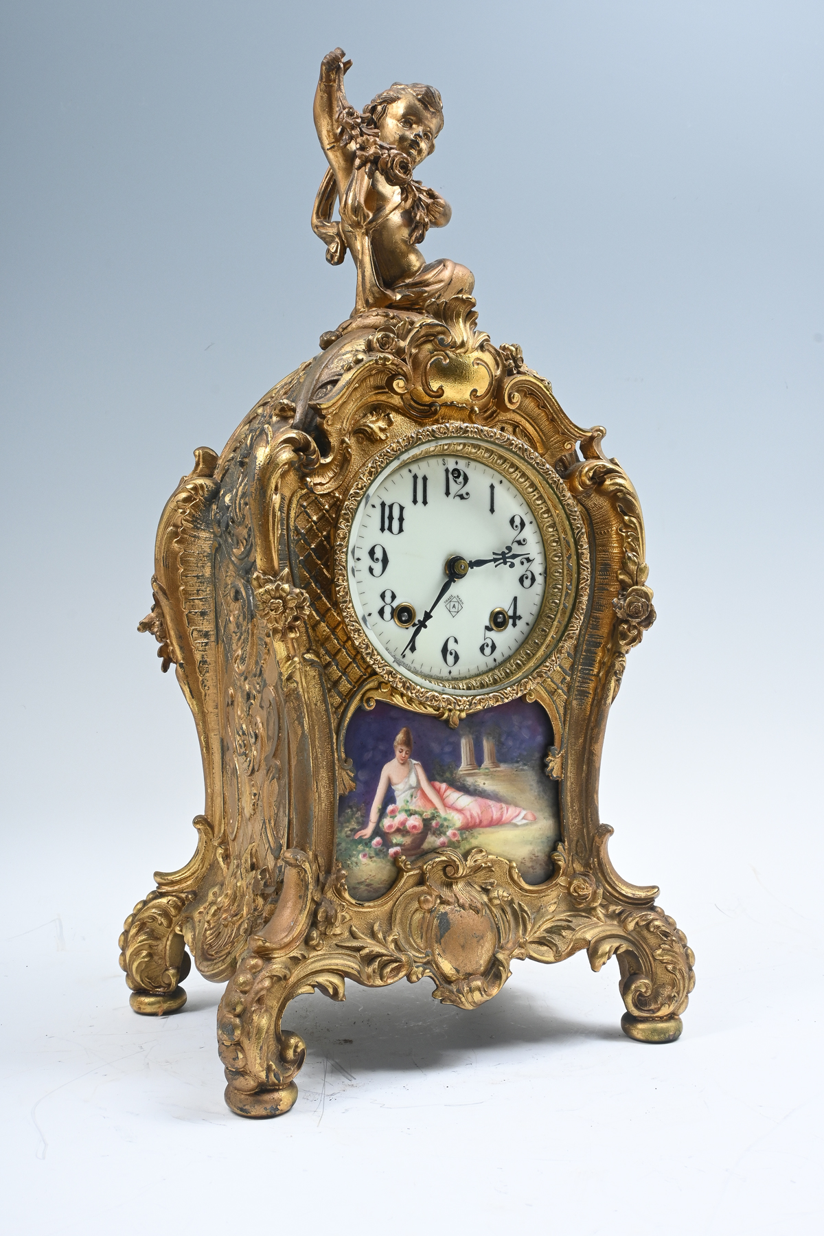 ANSONIA GILT METAL CLOCK: Gilt figural