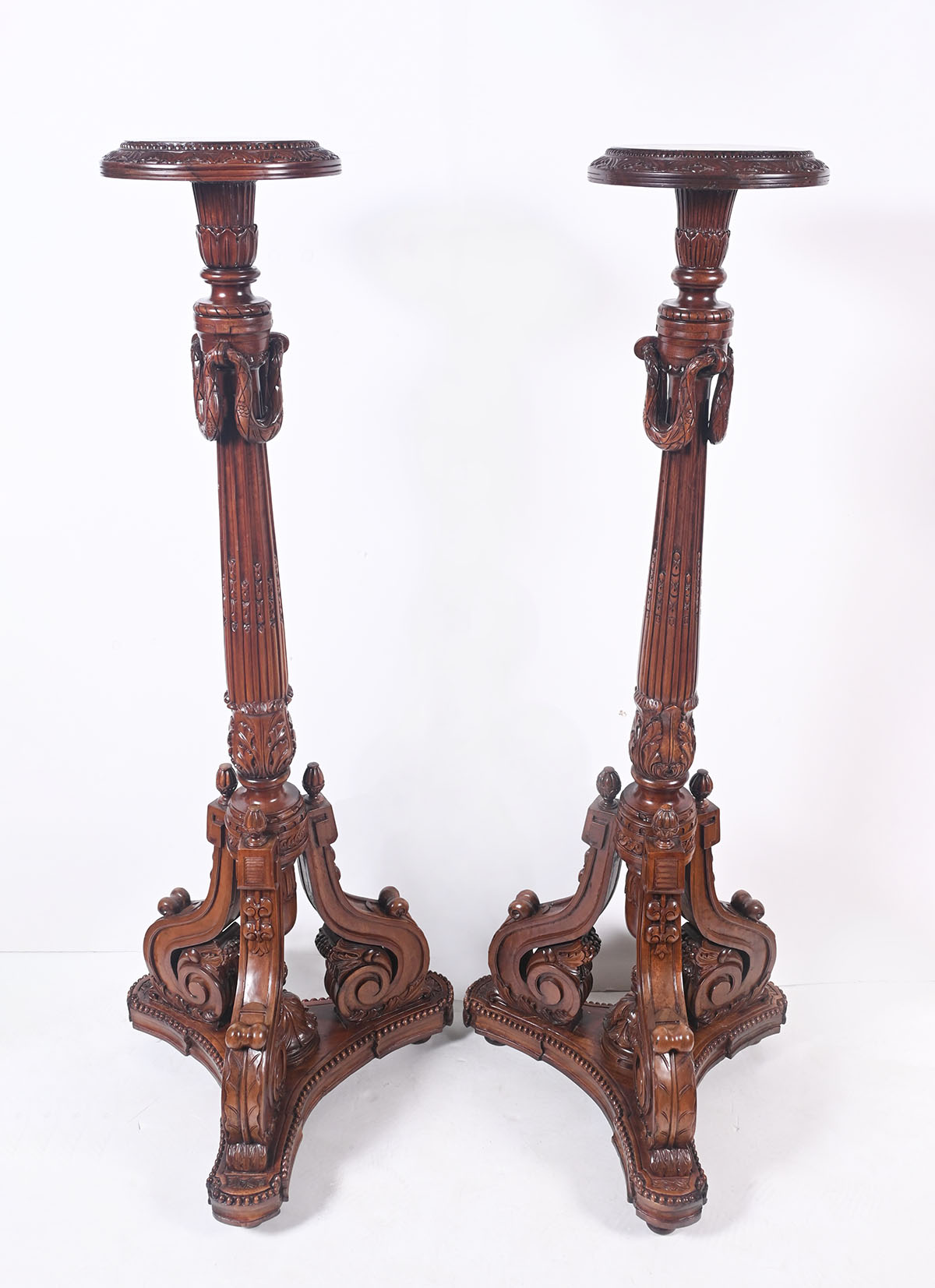PAIR OF CARVED WOODEN FERN STANDS: