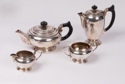 A sterling silver four-piece tea set,