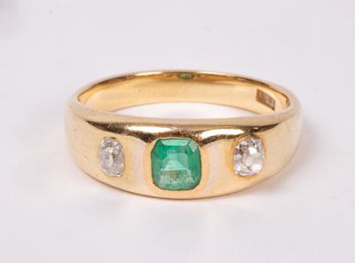 An emerald and diamond dress ring set