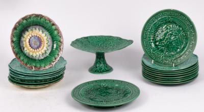 A collection of nineteen green-glazed