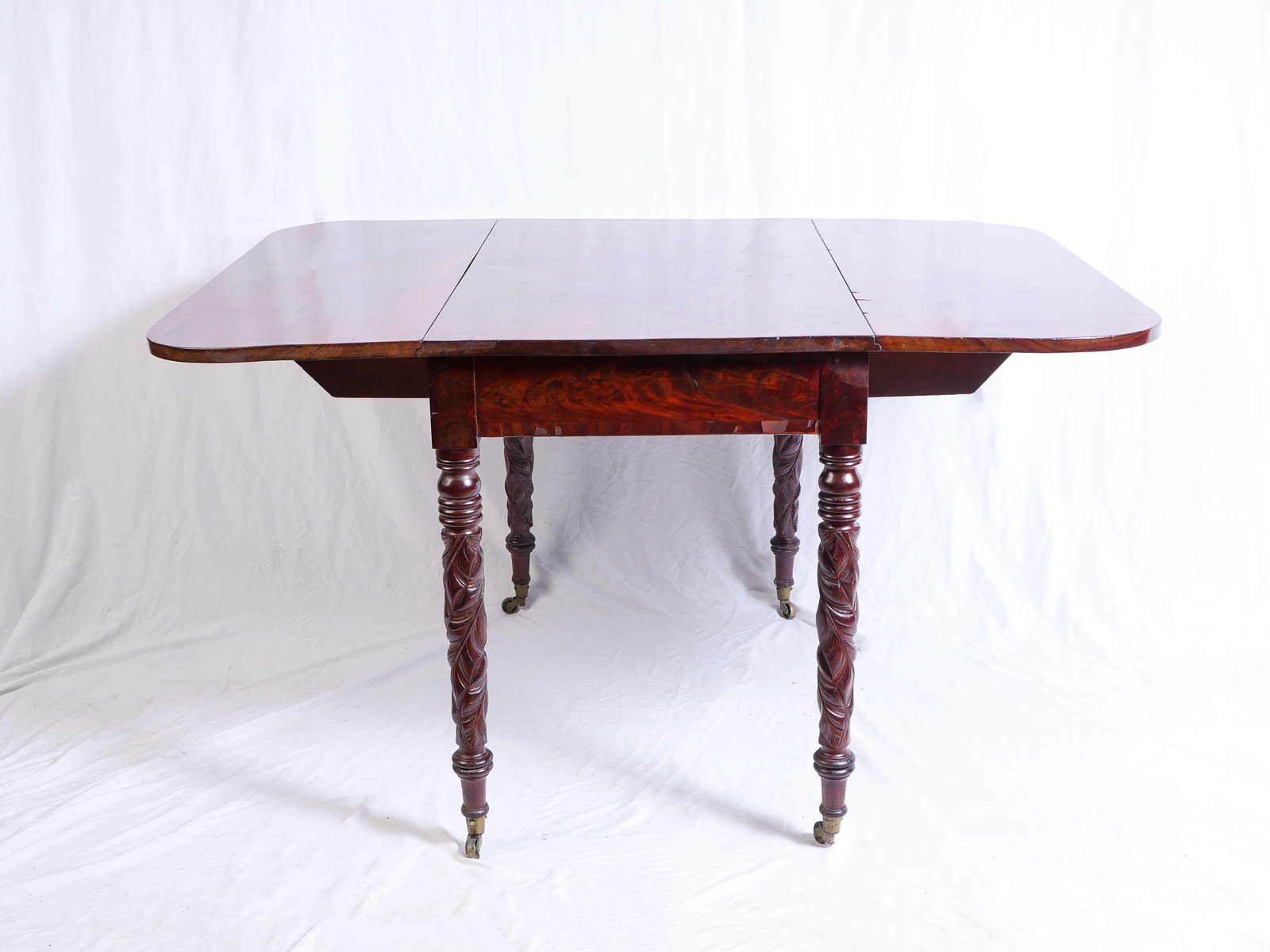CARVED MAHOGANY DROP LEAF TABLE:
