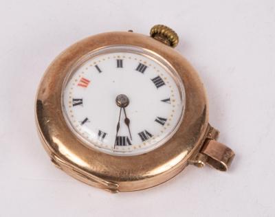 A 9ct gold watch (missing strap),