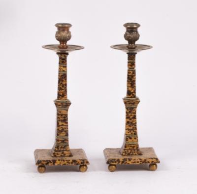 A pair of faux tortoiseshell candlesticks  36af29