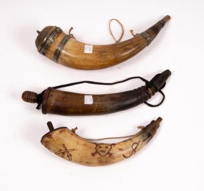 An Eastern powder horn with metal mounts