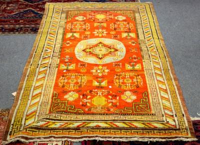 An Eastern rug with a central medallion