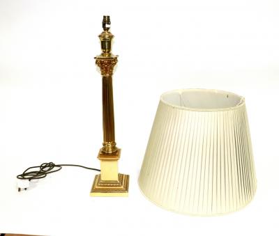 A brass Corinthian column lamp