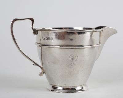 An Art Deco silver three-piece tea set,