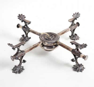 A plated dish cross with anthemion supports