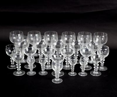 A part glass table service with