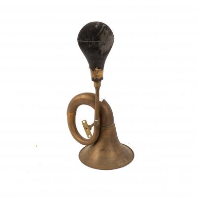 A brass car horn