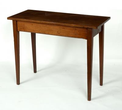 A rectangular mahogany table on