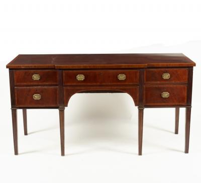 A Regency mahogany and inlaid sideboard