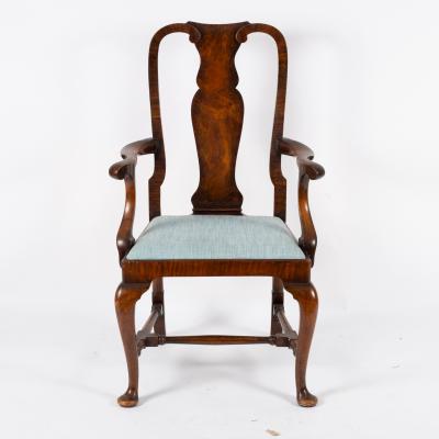 A walnut open armchair, of early