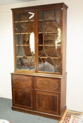A mahogany glazed bookcase/cabinet,