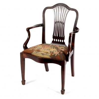 A George III mahogany open armchair,