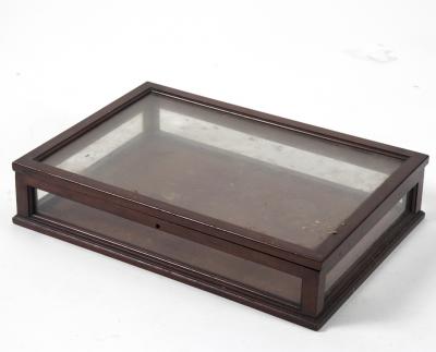 A mahogany framed table top display