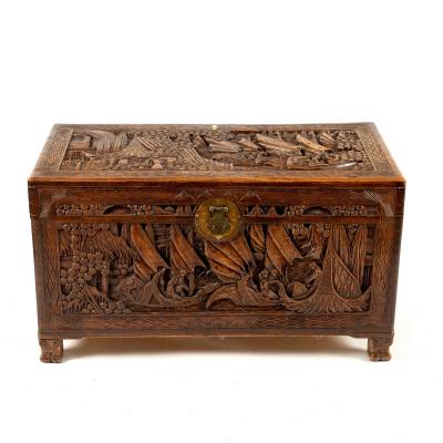 An Oriental carved camphorwood chest,