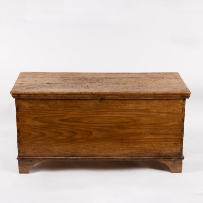 A pine blanket chest on bracket