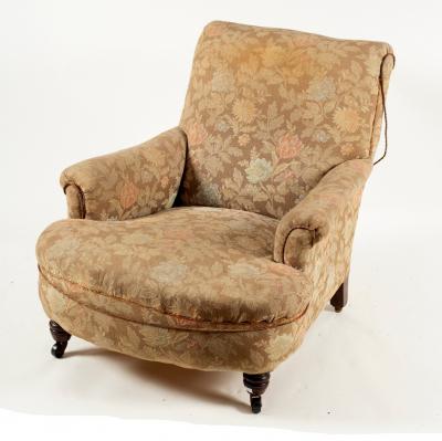 A Howard style upholstered armchair