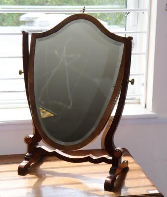 A Victorian shield-shaped swing