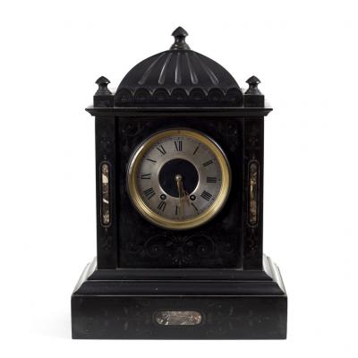 A black slate mantel clock the silvered