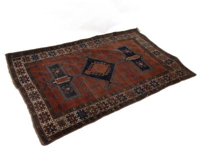 A kilim rug with geometric designs