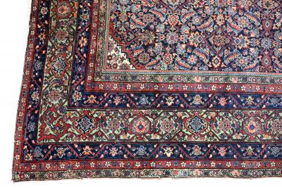 A large Fereghan carpet, circa