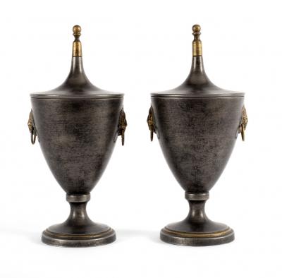 A pair of oval toleware vases and covers,