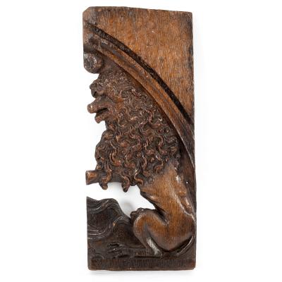 A 17th Century panel fragment carved