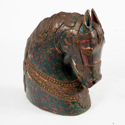 A Spanish carved wooden horse head