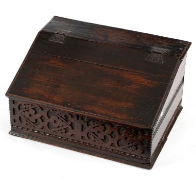 A carved oak bible box, 57cm wide